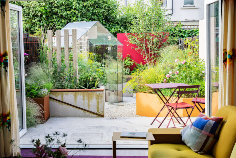 greenhouse-concrete-colourful-garden